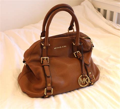 cheap used michael kors handbags|michael kors luggage clearance.